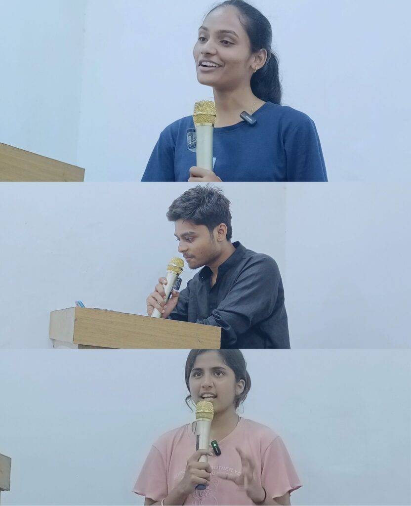 Student at AIM English speaking confidently on stage during a public speaking activity