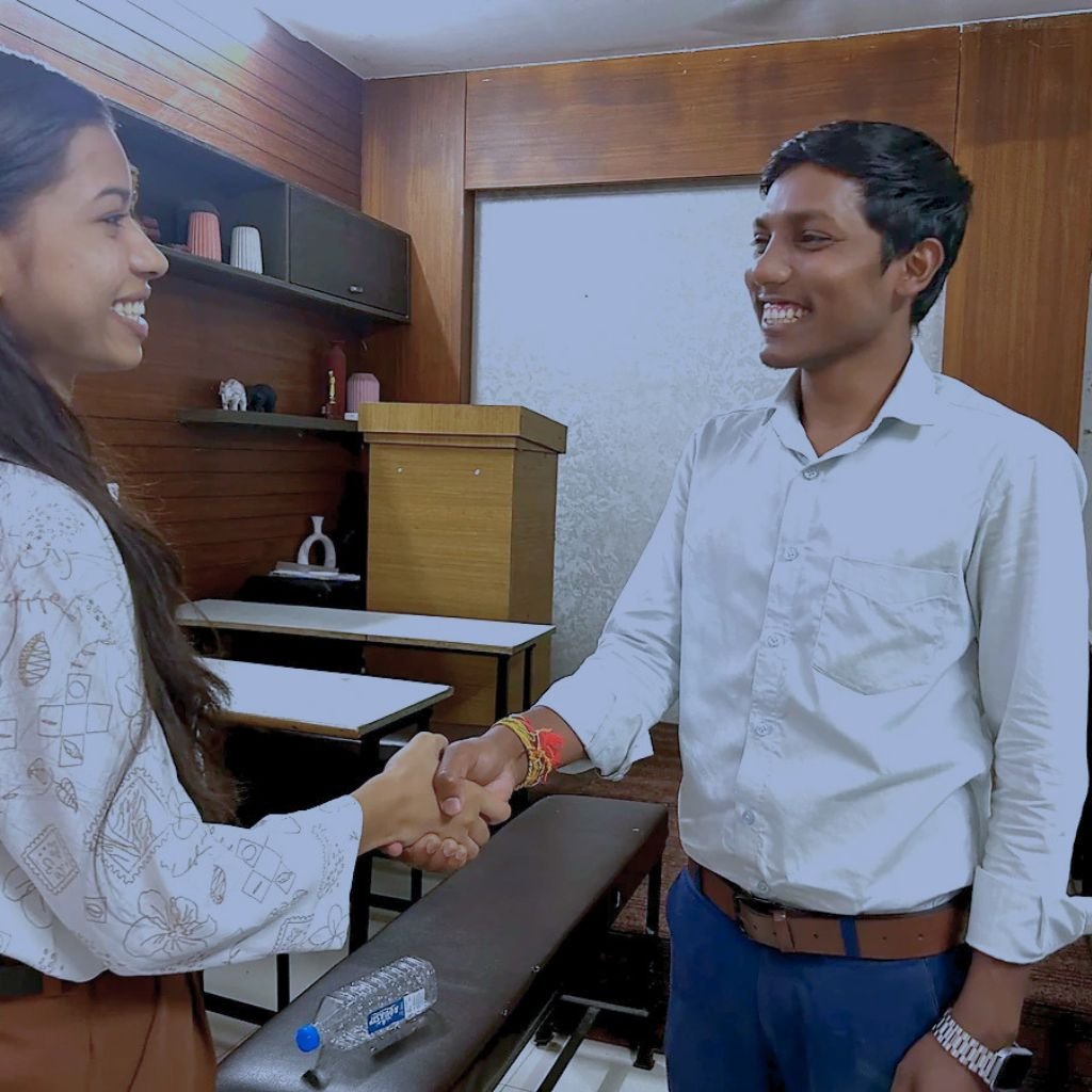 Student practising a mock job interview with an interviewer at AIM English Raipur