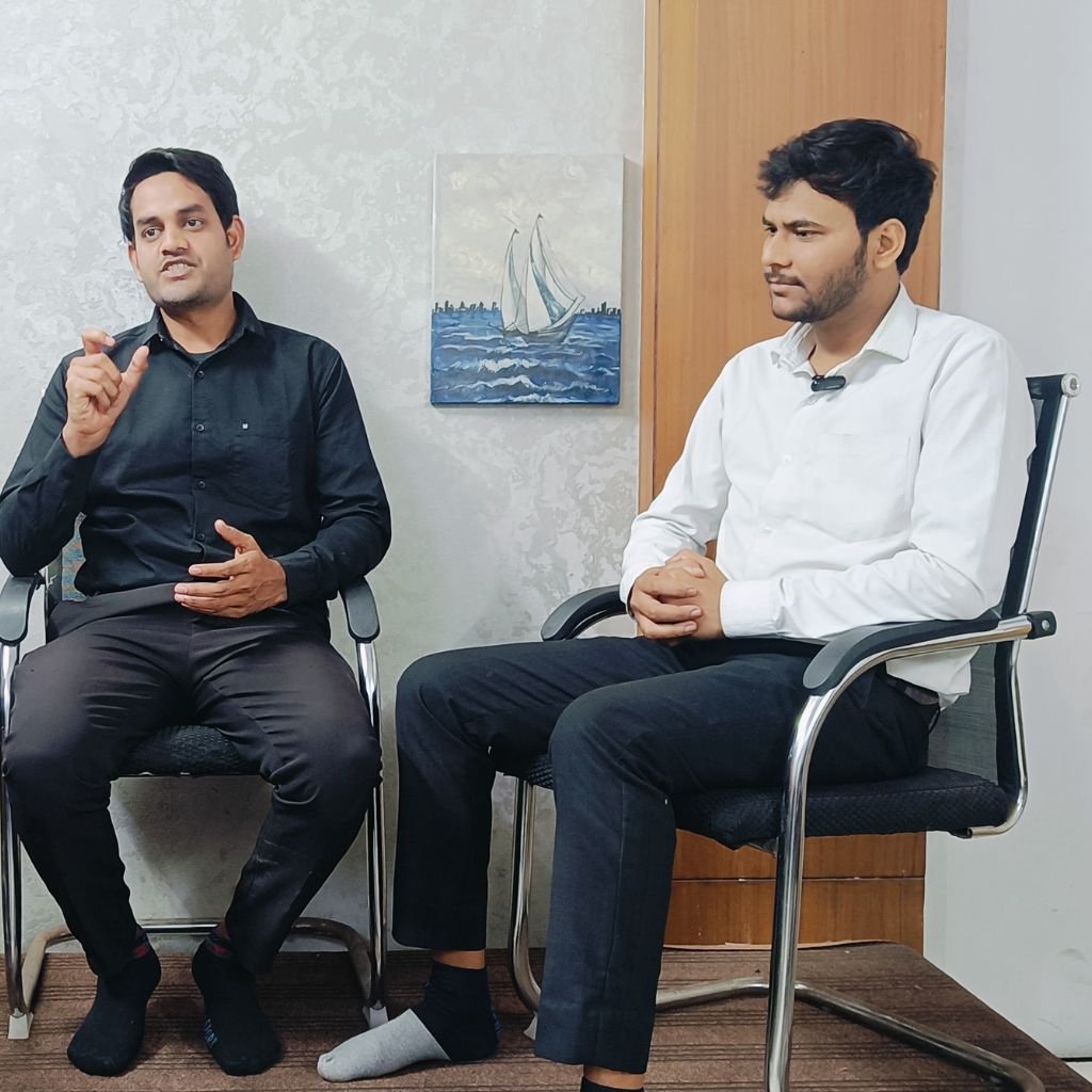 Students practising job interview role-play in a classroom at AIM English Raipur