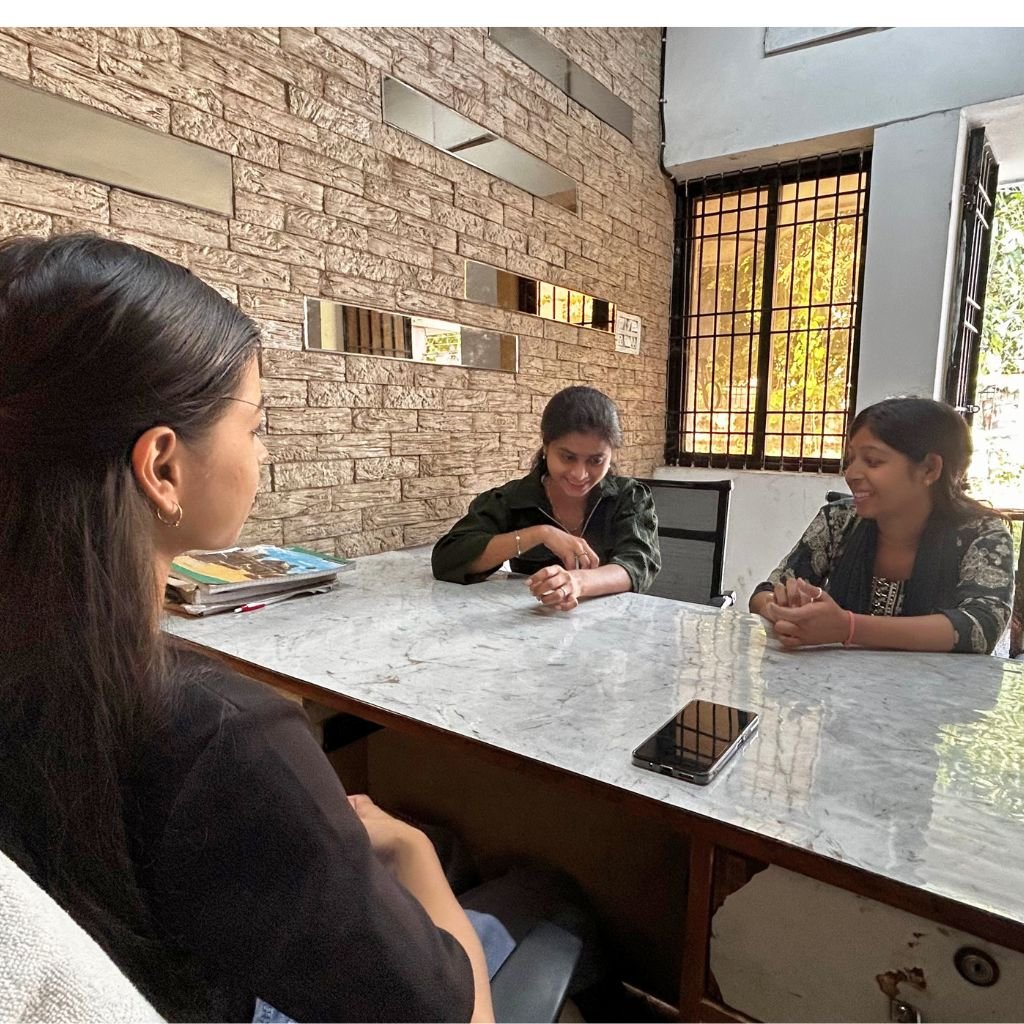 Students practising job interview role-play in a classroom at AIM English Raipur