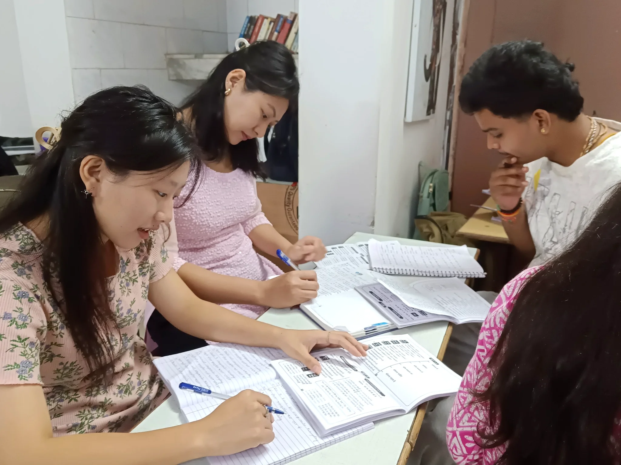 Students learning English sentence formation at AIM English Raipur