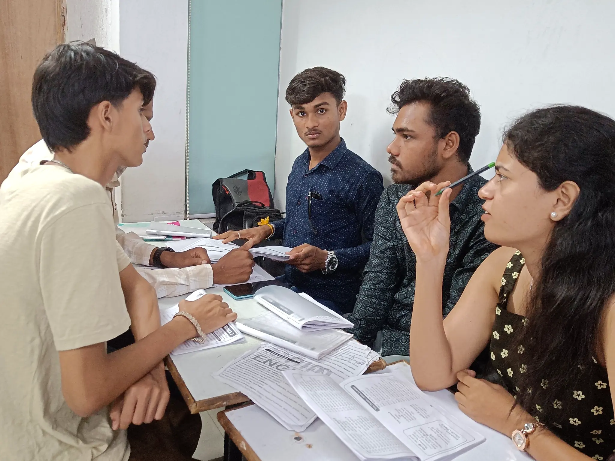 Students participating in a group discussion at AIM English Raipur