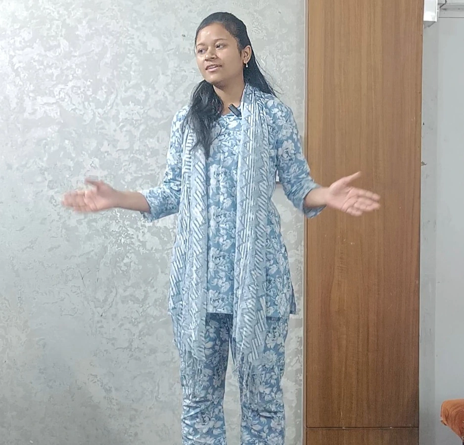 Student practising positive body language during a personality development activity at AIM English Raipur